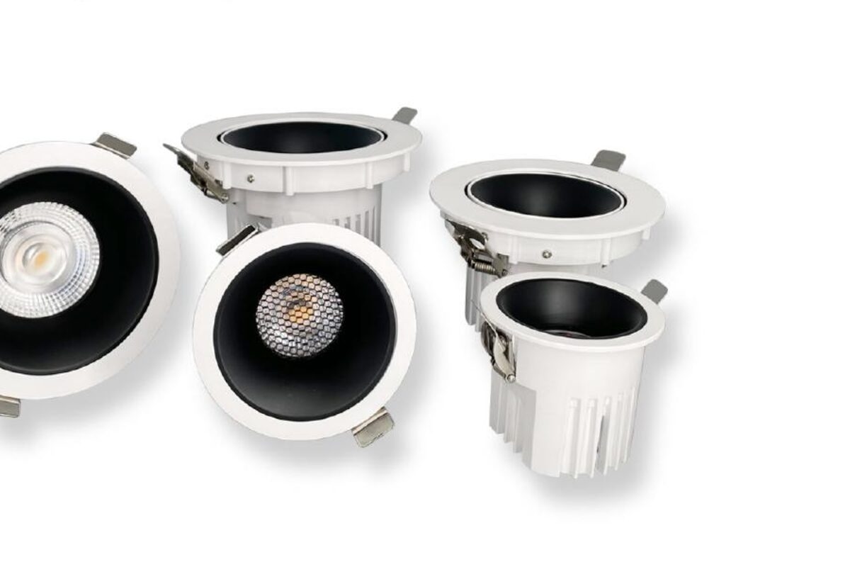 JONNY high power downlights in round and multi-head square trims, white bodies with black reflectors