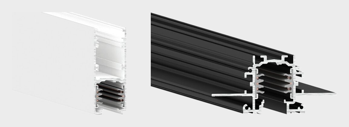 Two A.A.G. Stucchi ONETRACK profiles: a white surface and suspended track with a tall housing, and a black trimless track with plaster wings